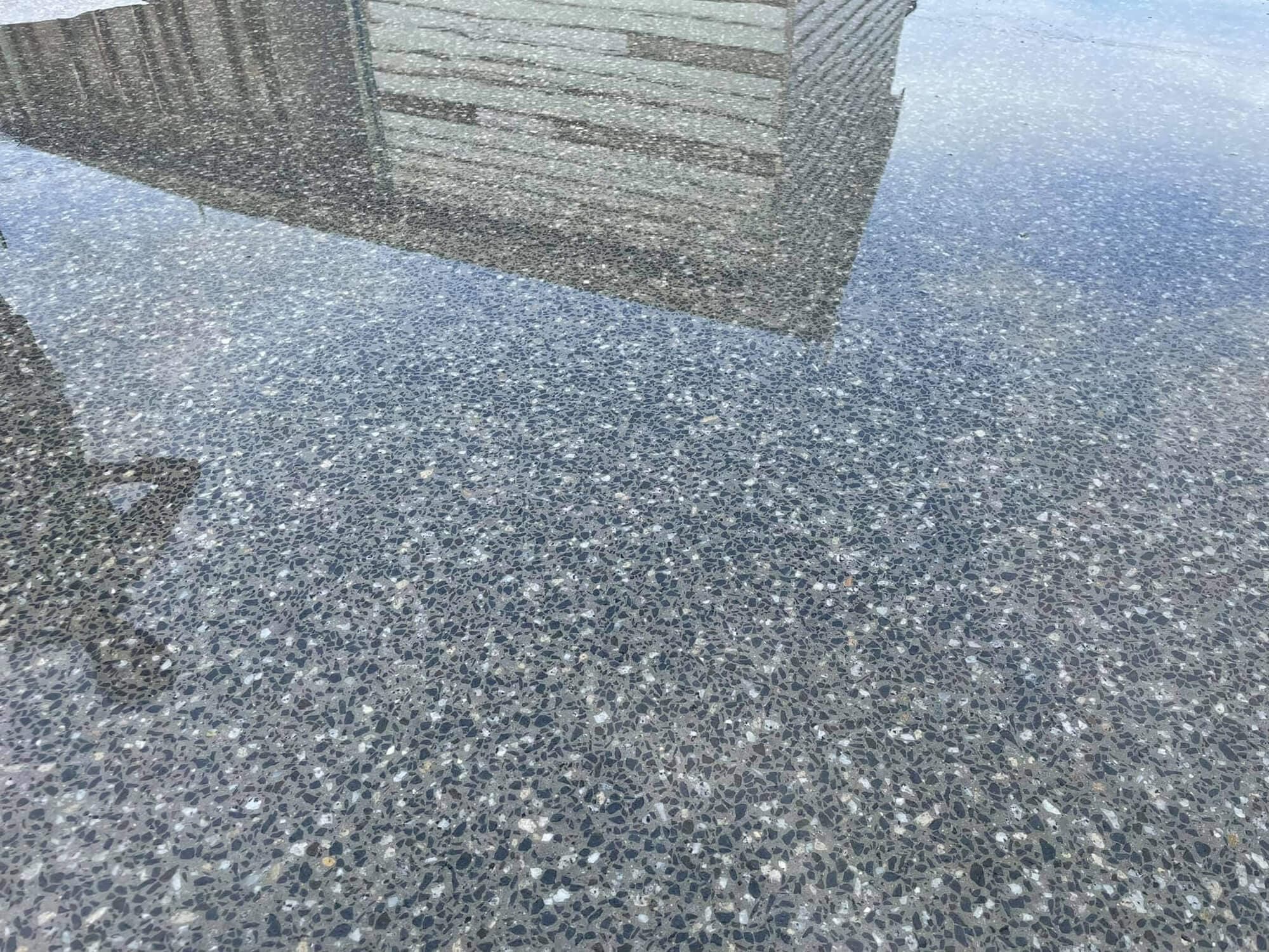 Freshly ground concrete floor showing a clean flat surface ready for coating