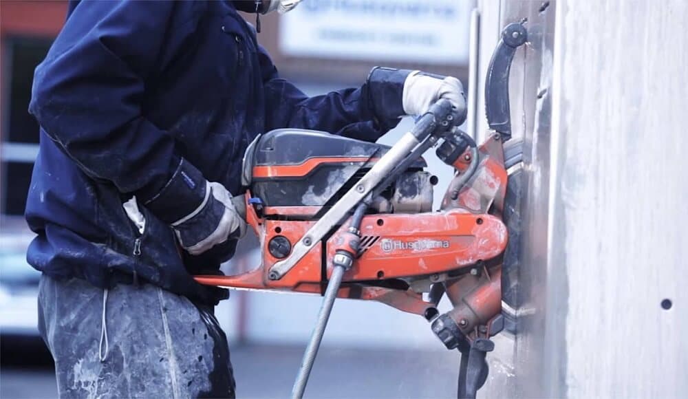 Ring saw blade plunged into a concrete section during a precision cut