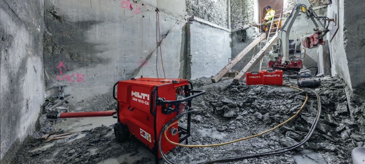 Diamond wire saw rigged up against a mass concrete section on a civil site