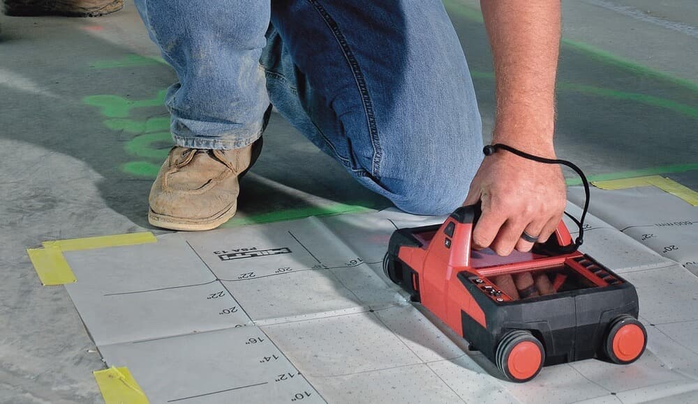 Hilti PS-1000 concrete scanner mapping reinforcement across a slab surface